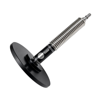 Flexible spring extension connects to a suction cup dildo adapter.