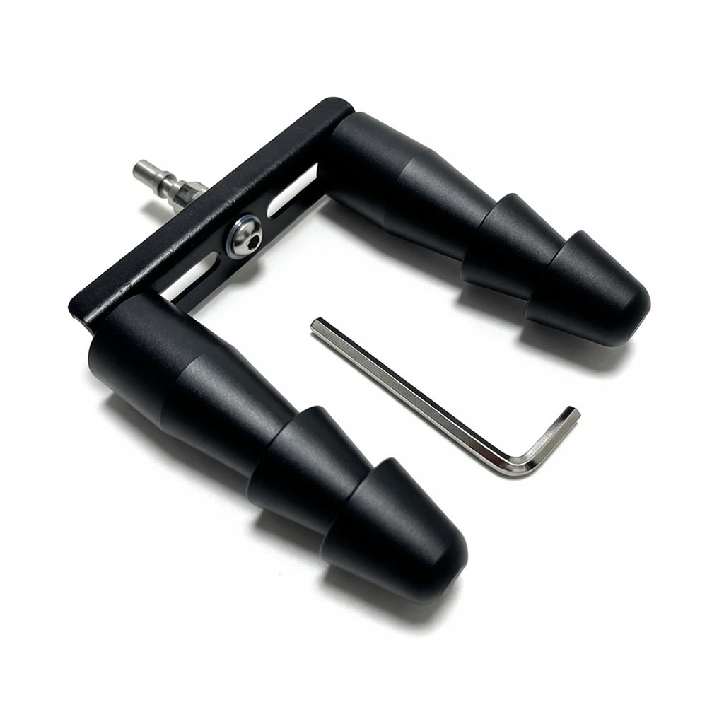 Angled view of a Vac-U-Lock doubler adapter with R-Lock connector, two black tiered bodies, and an Allen key.