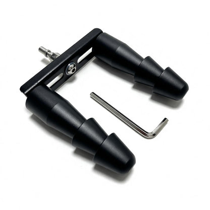 Angled view of a Vac-U-Lock doubler adapter with R-Lock connector, two black tiered bodies, and an Allen key.